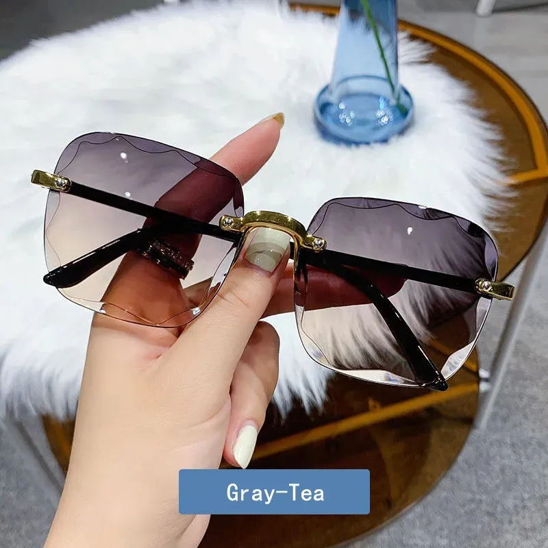 2023 New Rimless Women's Sunglasses Fashion Gradient Lenses Sun glasses Lady Vintage Alloy Legs Classic Designer Shades UV400