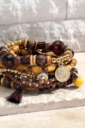 Walnut seed bracelet with charm accents *
